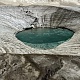 Мульда на леднике - воронка с талой водой